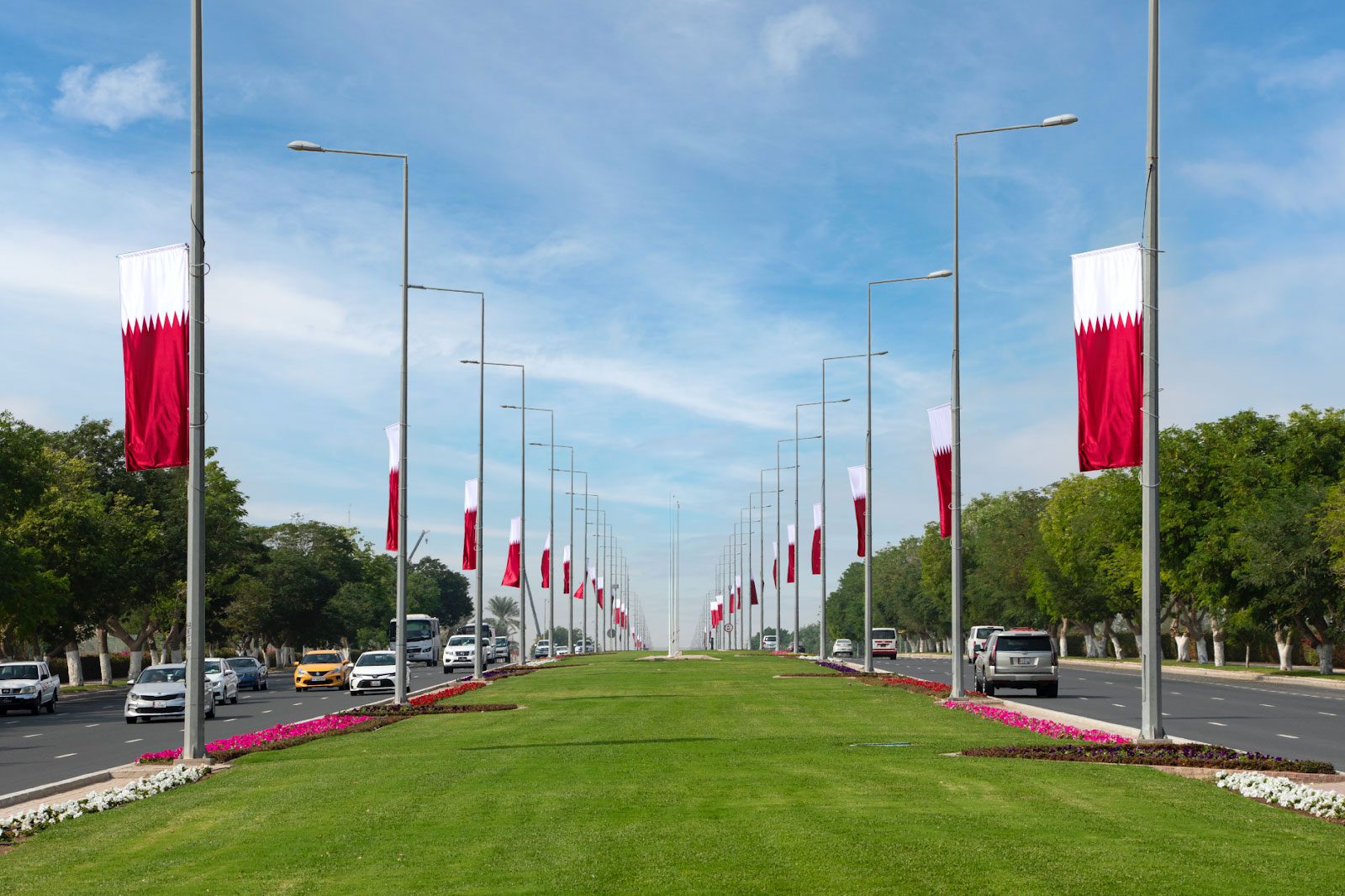 City dressing with street banner flags in Doha