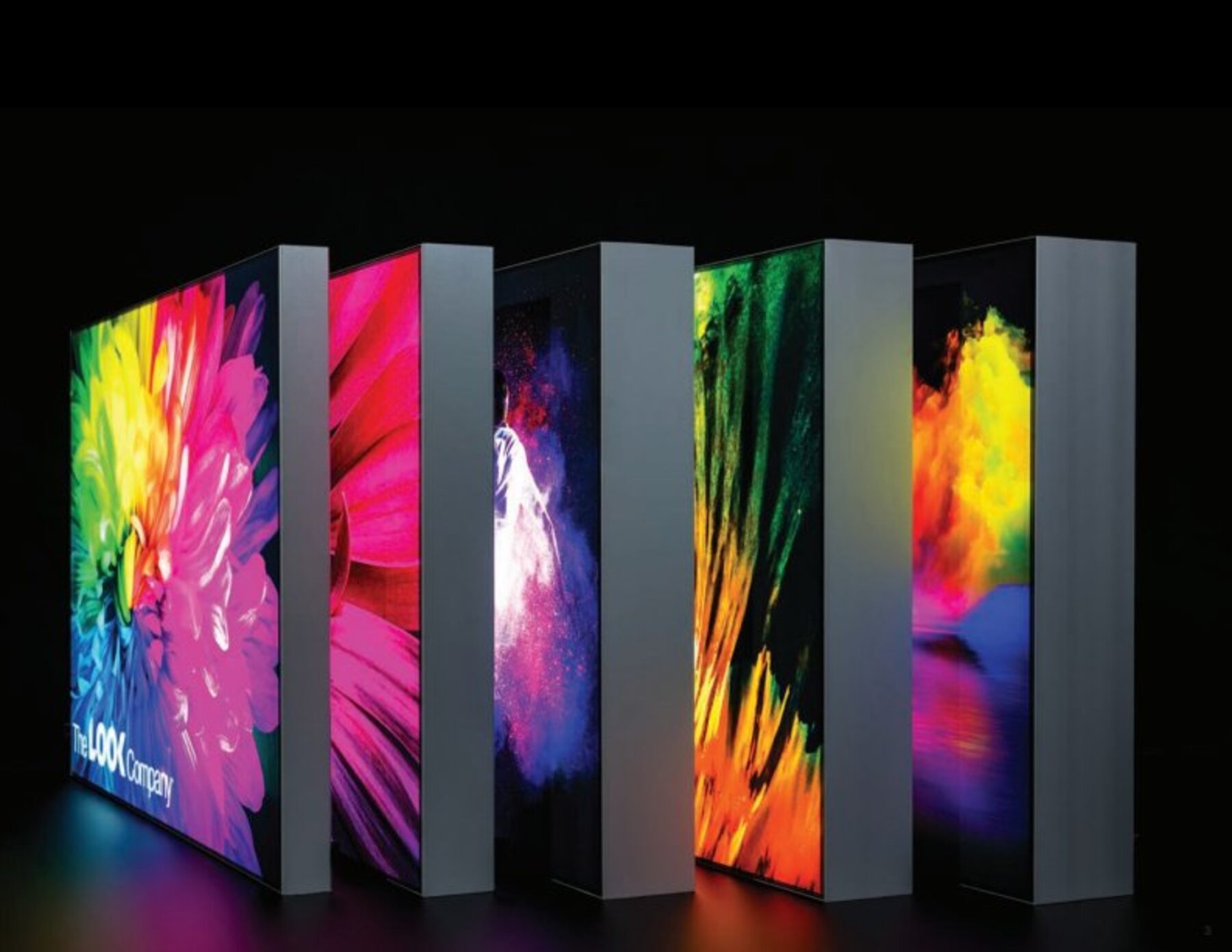 Backlit fabric frame system in retail environment